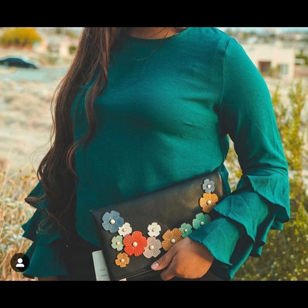 Black floral clutch